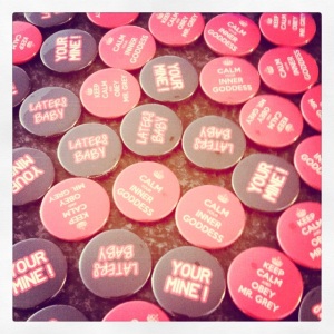 "Fifty Shades of Grey" buttons, some misspelled.